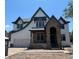 Eye-catching two-story home with stone archway and modern architectural details at 4224 W Corona St, Tampa, FL 33629