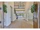 Bright foyer featuring staircase, chandelier, wood beams and hardwood flooring at 4224 W Corona St, Tampa, FL 33629