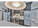 Modern kitchen has stainless range, dual refrigerators, custom cabinets, and a large island at 4224 W Corona St, Tampa, FL 33629
