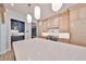 Bright kitchen with a large island, white marble countertops, and custom lighting at 4224 W Corona St, Tampa, FL 33629