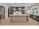 Gourmet kitchen with a large island, stainless appliances, and custom cabinets and countertops at 4224 W Corona St, Tampa, FL 33629