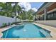 Spacious pool area with fountains, spa, and meticulous landscaping at 4224 W Corona St, Tampa, FL 33629