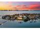 Aerial view of waterfront home on peninsula at 429 St Andrews Dr, Belleair, FL 33756