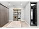 Well-organized dressing room featuring shelving, drawers, and a large walk-in shower at 429 St Andrews Dr, Belleair, FL 33756