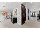 The second story hallway is bright with high ceilings and neutral colors at 429 St Andrews Dr, Belleair, FL 33756