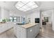 Gourmet kitchen with granite countertops and a large center island at 429 St Andrews Dr, Belleair, FL 33756