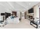 This main bedroom features a fireplace, high ceilings, and a wet bar at 429 St Andrews Dr, Belleair, FL 33756