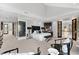The main bedroom features neutral colors, high ceilings, and a small wet bar at 429 St Andrews Dr, Belleair, FL 33756