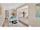 Dining area featuring view to the living room and modern kitchen at 4304 W Arch St, Tampa, FL 33607