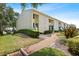 Charming condo with well-manicured lawn, lush hedges, and private entrance at 4306 La Mora Ct, Tampa, FL 33611