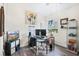 Bright home office features a modern desk, computer, and an airy window view at 4306 La Mora Ct, Tampa, FL 33611