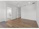 Spacious bedroom featuring hardwood floors and a ceiling fan at 500 E Davis Blvd, Tampa, FL 33606