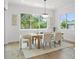 Bright dining room featuring modern light fixture and a dining table at 500 E Davis Blvd, Tampa, FL 33606