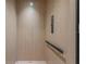 A modern residential elevator with wood-paneled walls and accessible features at 500 E Davis Blvd, Tampa, FL 33606