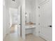 Elegant interior entryway featuring a built-in vanity and tile floors at 500 E Davis Blvd, Tampa, FL 33606
