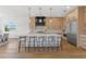 Bright kitchen featuring an island with seating, modern appliances, and stylish finishes at 500 E Davis Blvd, Tampa, FL 33606