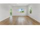 Spacious living room featuring light hardwood floors and natural light at 500 E Davis Blvd, Tampa, FL 33606