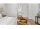 Bright and spacious main bedroom featuring warm wood flooring, comfortable chairs, and tasteful decorations and design at 500 E Davis Blvd, Tampa, FL 33606