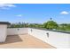 This rooftop deck features sleek lighting, neutral tones, and a stunning cityscape view at 500 E Davis Blvd, Tampa, FL 33606