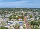Aerial view of neighborhood showcasing the home with city skyline in background at 5051 5Th S Ave, St Petersburg, FL 33707