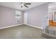 This bedroom features tile floors, a ceiling fan, and an air conditioning unit at 5051 5Th S Ave, St Petersburg, FL 33707