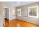 Bedroom with wood floors and bright windows at 5051 5Th S Ave, St Petersburg, FL 33707