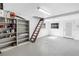Spacious garage with shelving and exterior exit at 5051 5Th S Ave, St Petersburg, FL 33707