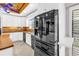 Bright kitchen boasts white cabinetry, stylish countertops, and a modern stainless steel refrigerator at 5051 5Th S Ave, St Petersburg, FL 33707