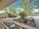 Large back patio with lush greenery and serene landscaping, creating a peaceful outdoor retreat at 5100 Aragon S Way, St Petersburg, FL 33705