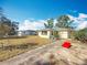 Charming single-story home with well-maintained lawn and concrete driveway at 5100 Aragon S Way, St Petersburg, FL 33705