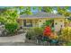 Charming single-story home with a beautiful front yard and well-maintained landscaping at 5100 Aragon S Way, St Petersburg, FL 33705