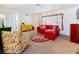 Bright living room featuring an open floor plan with carpet and a decorative accent rug at 5100 Aragon S Way, St Petersburg, FL 33705