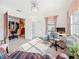 Bright home study features large windows, neutral walls and easy access to other rooms at 5100 Aragon S Way, St Petersburg, FL 33705