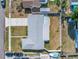 Aerial view of home with fenced backyard and nearby street at 5877 33Rd N Ave, St Petersburg, FL 33710