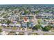Drone shot of a residential area showing various homes with swimming pools at 5877 33Rd N Ave, St Petersburg, FL 33710
