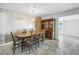 Formal dining room featuring a stylish light fixture and view to a bright adjacent sitting area at 5877 33Rd N Ave, St Petersburg, FL 33710
