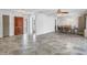 Spacious living room and dining area showcasing modern tile floors and ample natural light at 5877 33Rd N Ave, St Petersburg, FL 33710
