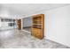 Living area featuring built-in shelving, adjacent to a dining room and sunroom at 5877 33Rd N Ave, St Petersburg, FL 33710