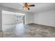 Open living area with tile flooring, bright sunlight and a view to the outdoor patio at 5877 33Rd N Ave, St Petersburg, FL 33710