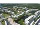 Aerial view of the residential buildings, waterways, and mature trees at 5970 80Th Street North # 206, St Petersburg, FL 33709
