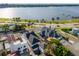 Scenic aerial view of waterfront homes featuring manicured landscaping and mature trees at 723 S Brevard Ave, Tampa, FL 33606