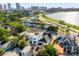 Panoramic aerial view showcasing a vibrant city skyline, waterfront, and residential neighborhood at 723 S Brevard Ave, Tampa, FL 33606