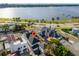Stunning aerial view of waterfront home, with lush landscaping and a charming neighborhood at 723 S Brevard Ave, Tampa, FL 33606