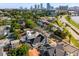 Stunning aerial view showcasing city skyline, waterfront, and neighborhood with lush greenery at 723 S Brevard Ave, Tampa, FL 33606