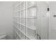 Bathroom features a tiled walk-in shower with glass block surround at 723 S Brevard Ave, Tampa, FL 33606
