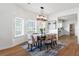 Bright dining room with natural light, hardwood floors, and neutral decor at 723 S Brevard Ave, Tampa, FL 33606