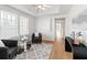 Bright flex room with natural light, hardwood floors and comfortable seating at 723 S Brevard Ave, Tampa, FL 33606