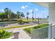 Inviting view from the porch showcasing the street with lush greenery and glimpses of the waterfront at 723 S Brevard Ave, Tampa, FL 33606