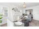 Bright living room featuring a decorative fireplace, modern lighting, and cozy seating at 723 S Brevard Ave, Tampa, FL 33606