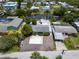 Aerial view of canal front house showing water access and lush landscaping at 832 Seabreeze Dr, Ruskin, FL 33570